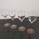 4 Luminarc white wine glasses with pink feet