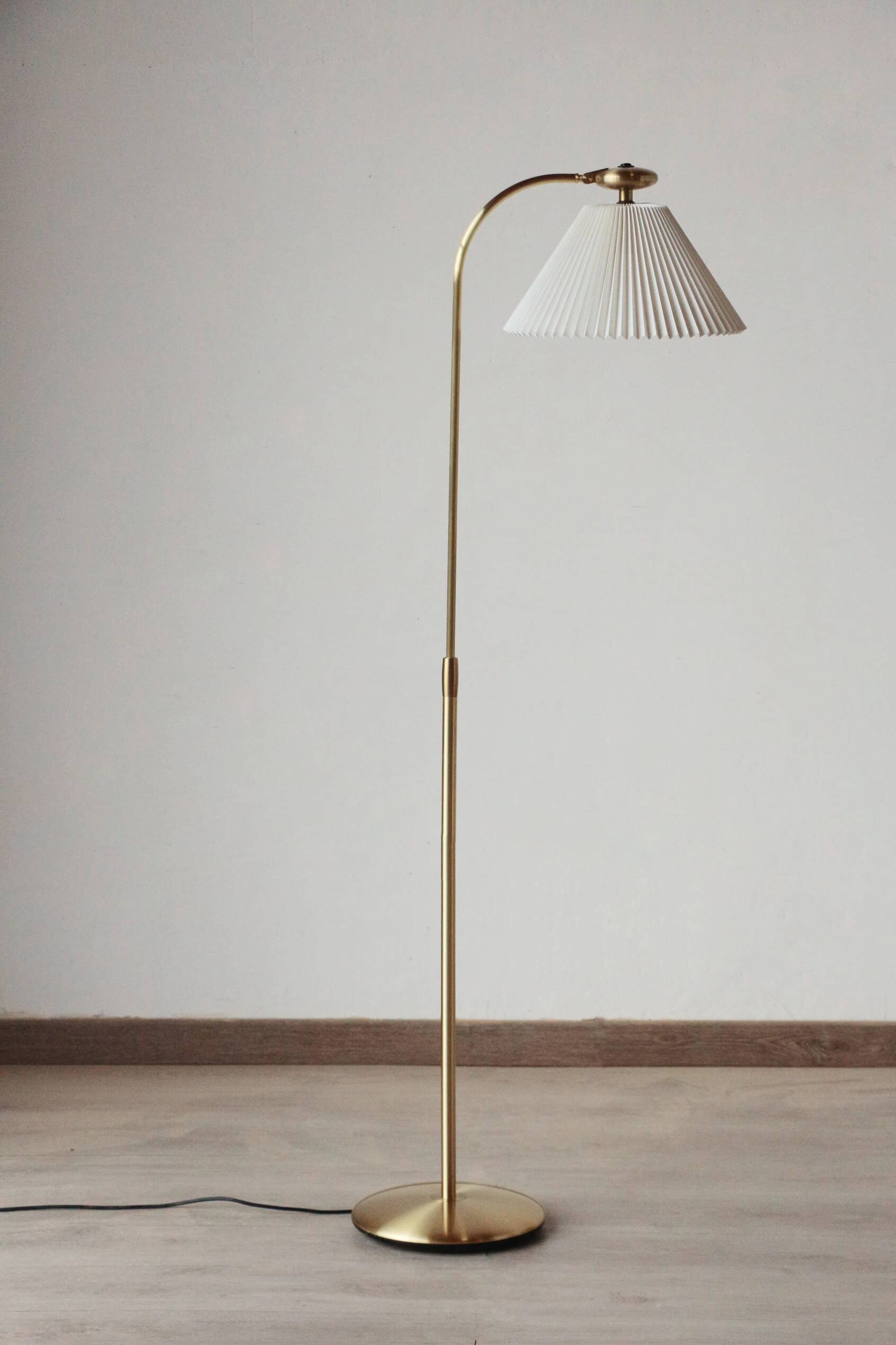Le Klint 340 floor lamp in brass – design by Philip Bro Ludvigsen