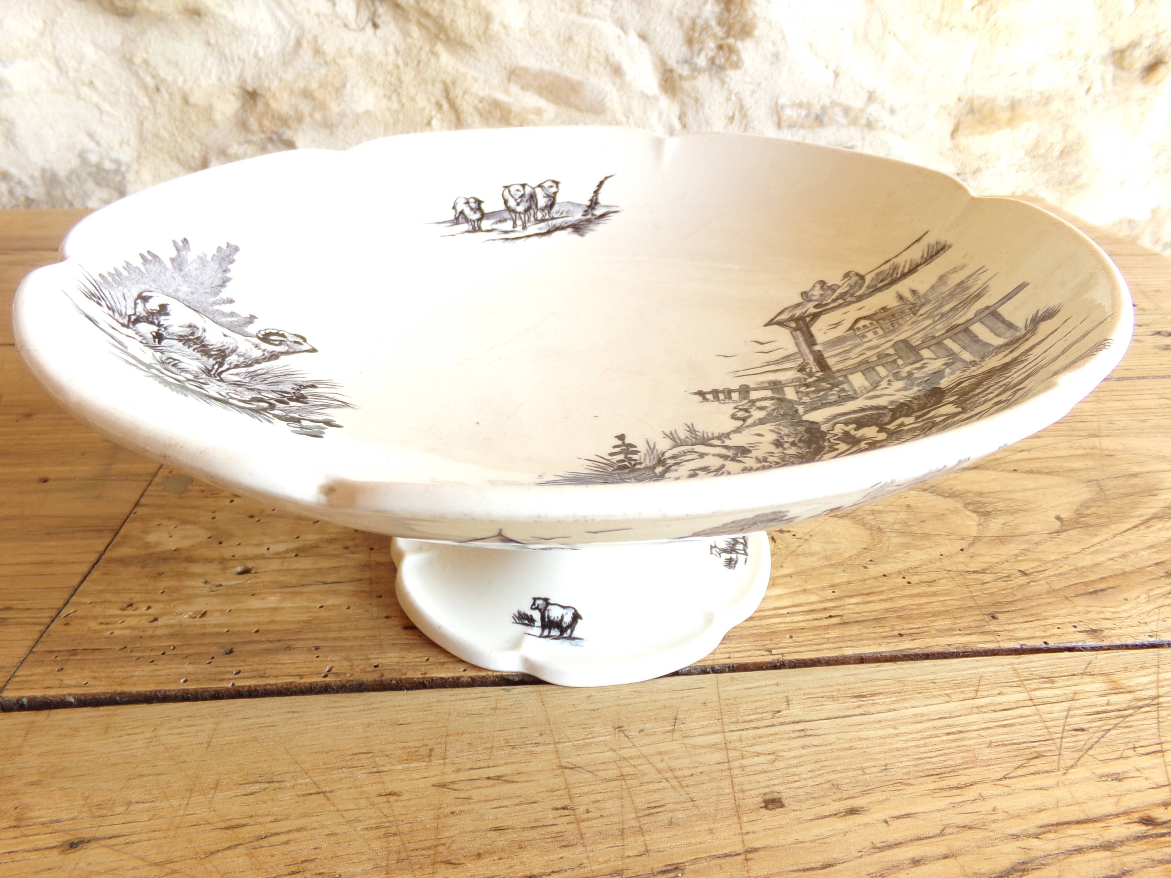 Antique compotier in rustic iron earth