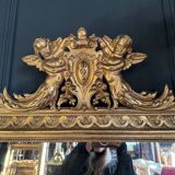 Miroir de cheminée d’époque napoléon iii en bois doré à décor de putti - xixe