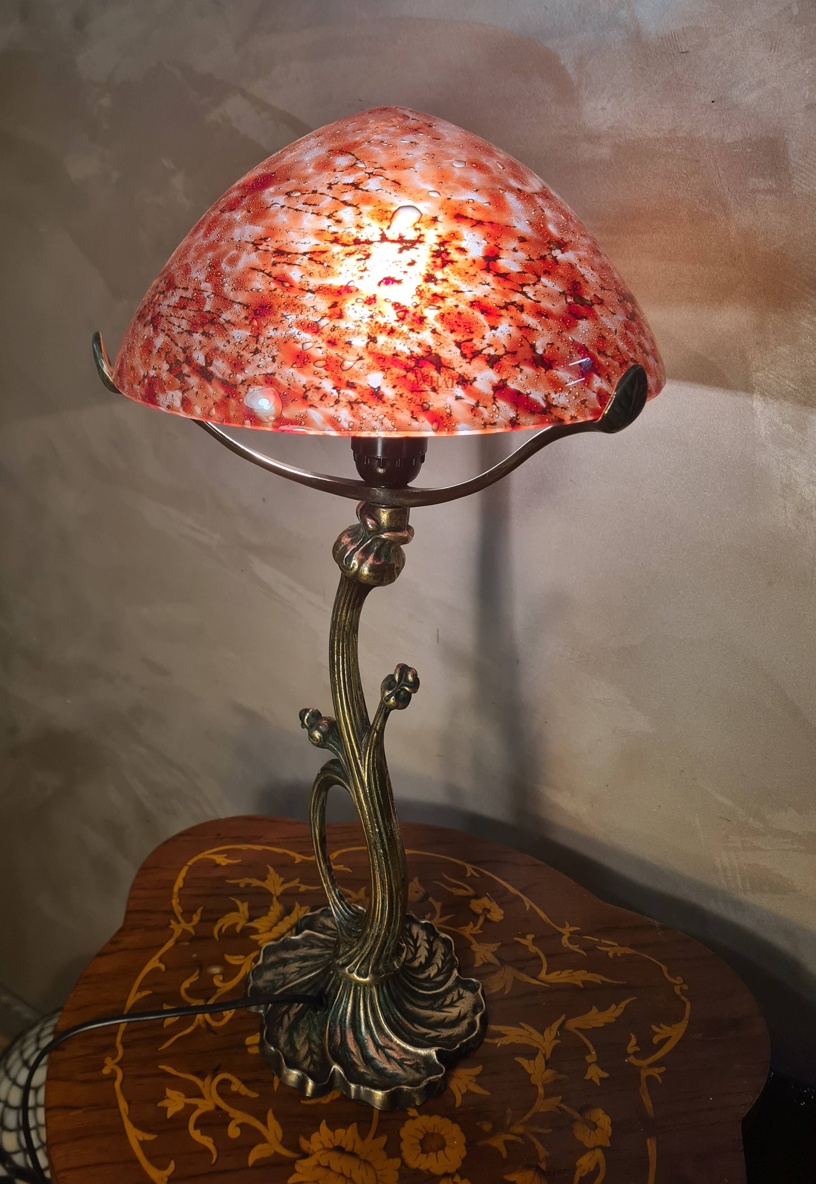 Bronze lamp in Art Nouveau style from 1975 to 1985 with a high-quality glass shade.