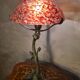 Bronze lamp in Art Nouveau style from 1975 to 1985 with a high-quality glass shade.