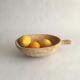 Ethnic wood fruit cut