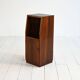 Cabinet with vinyl storage compartment