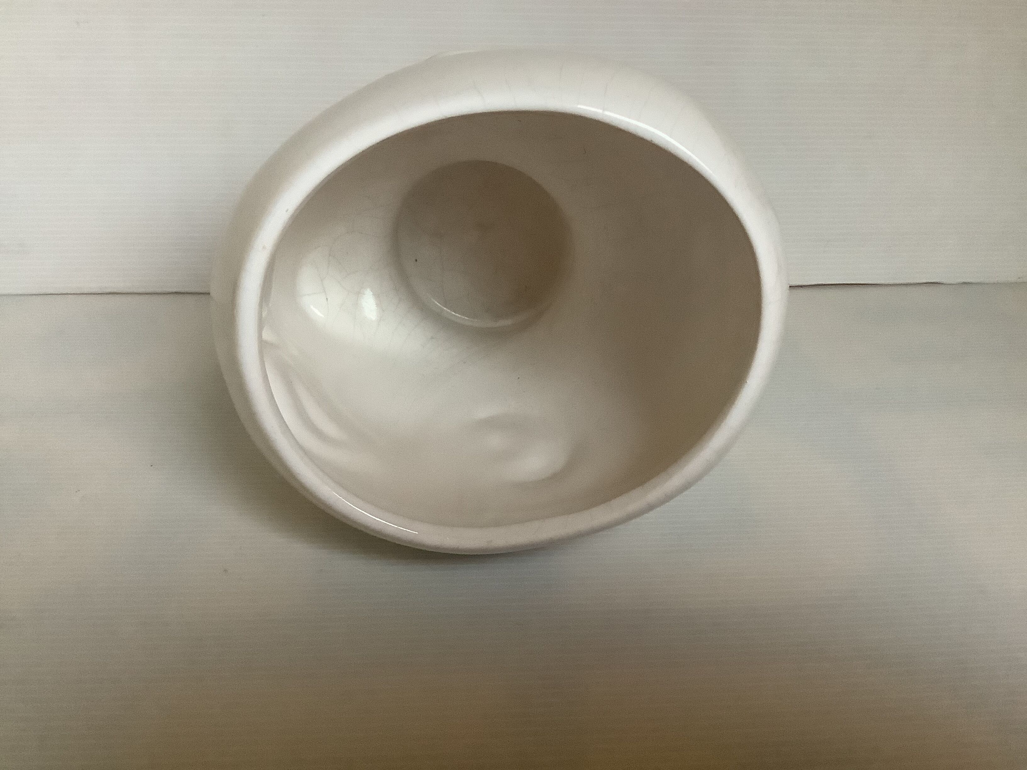 Man's head hide pot vase