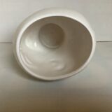 Man's head hide pot vase