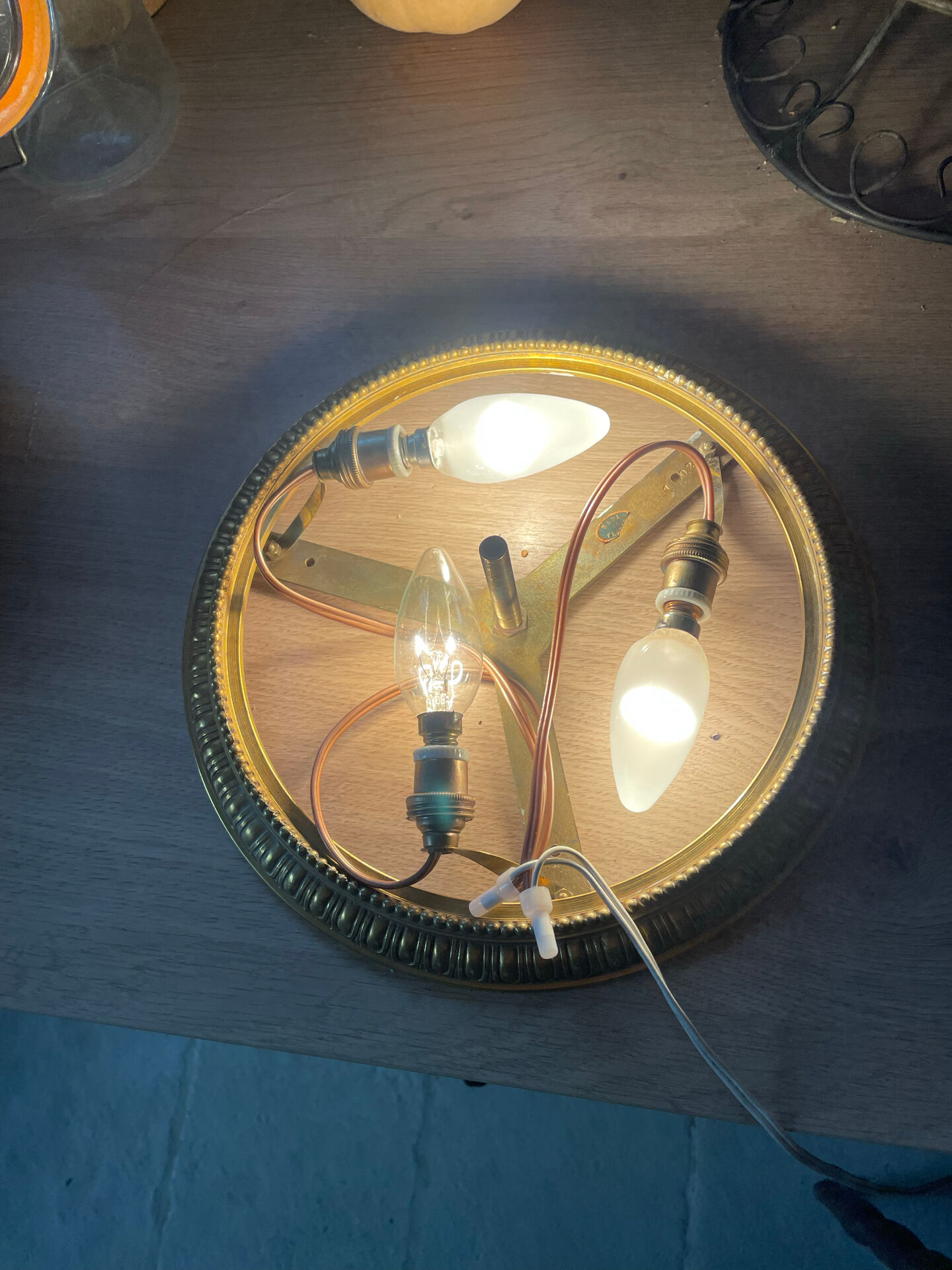 Antique ceiling light in bronze and cut crystal with diamond points.