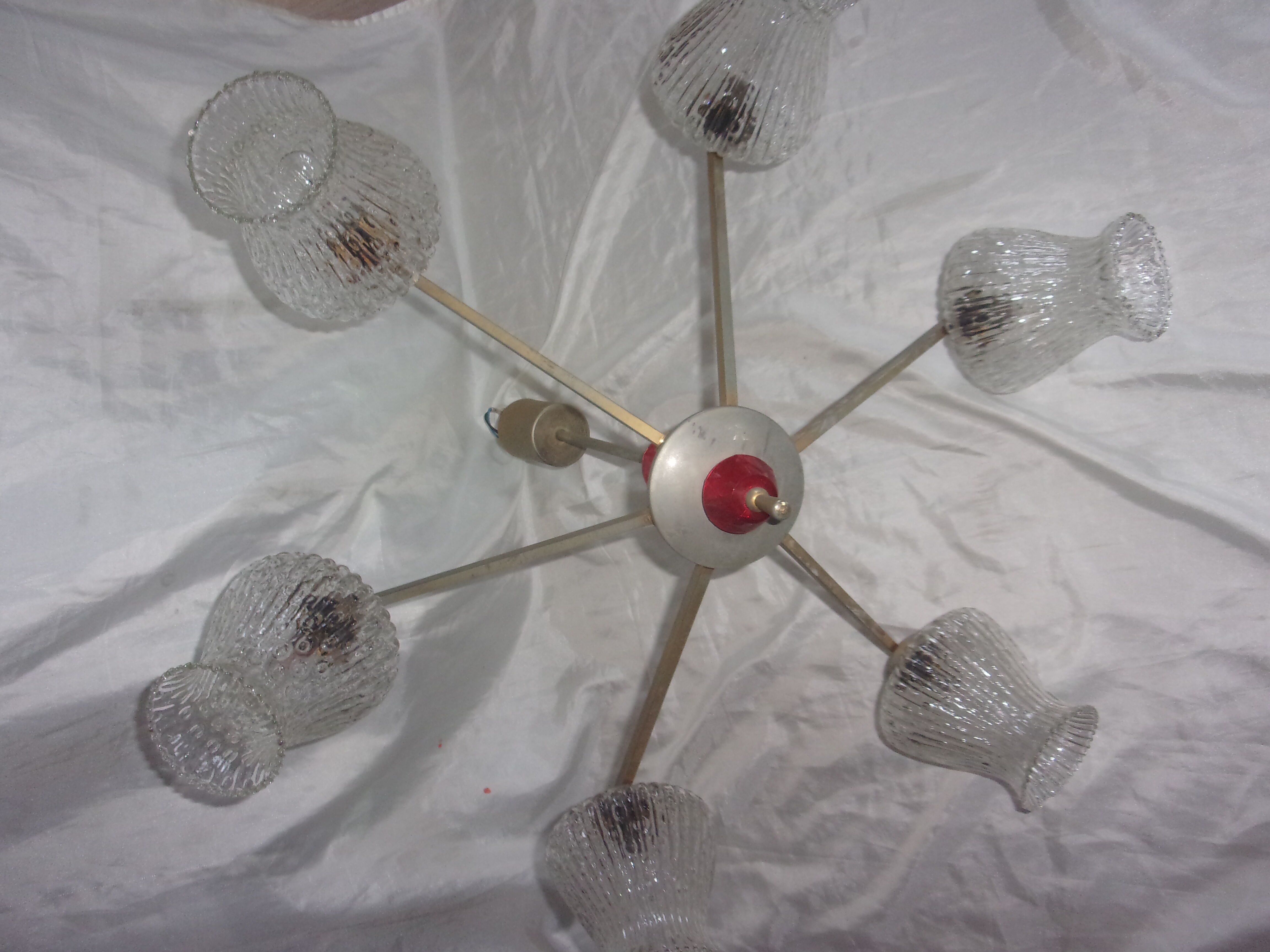 Chandelier in golden metal and vintage red pvc