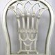 Paire de chaises en bois laqué blanc de style Louis XVI, XXe