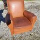 Fauteuil club en cuir brun art déco 1930