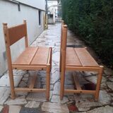 2 wooden and straw benches