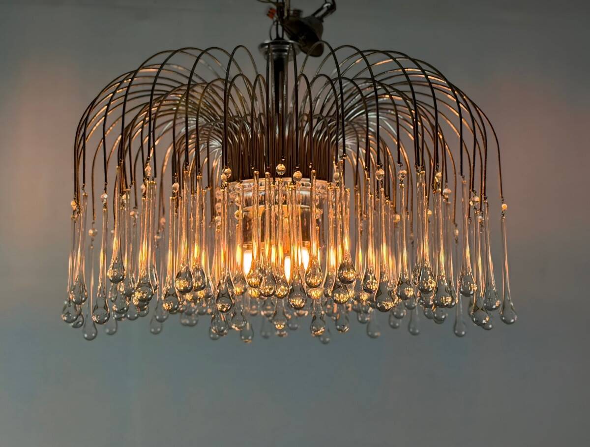 Pair of large chandeliers adorned with glass drops, chrome metal structures, Italy circa 1960.