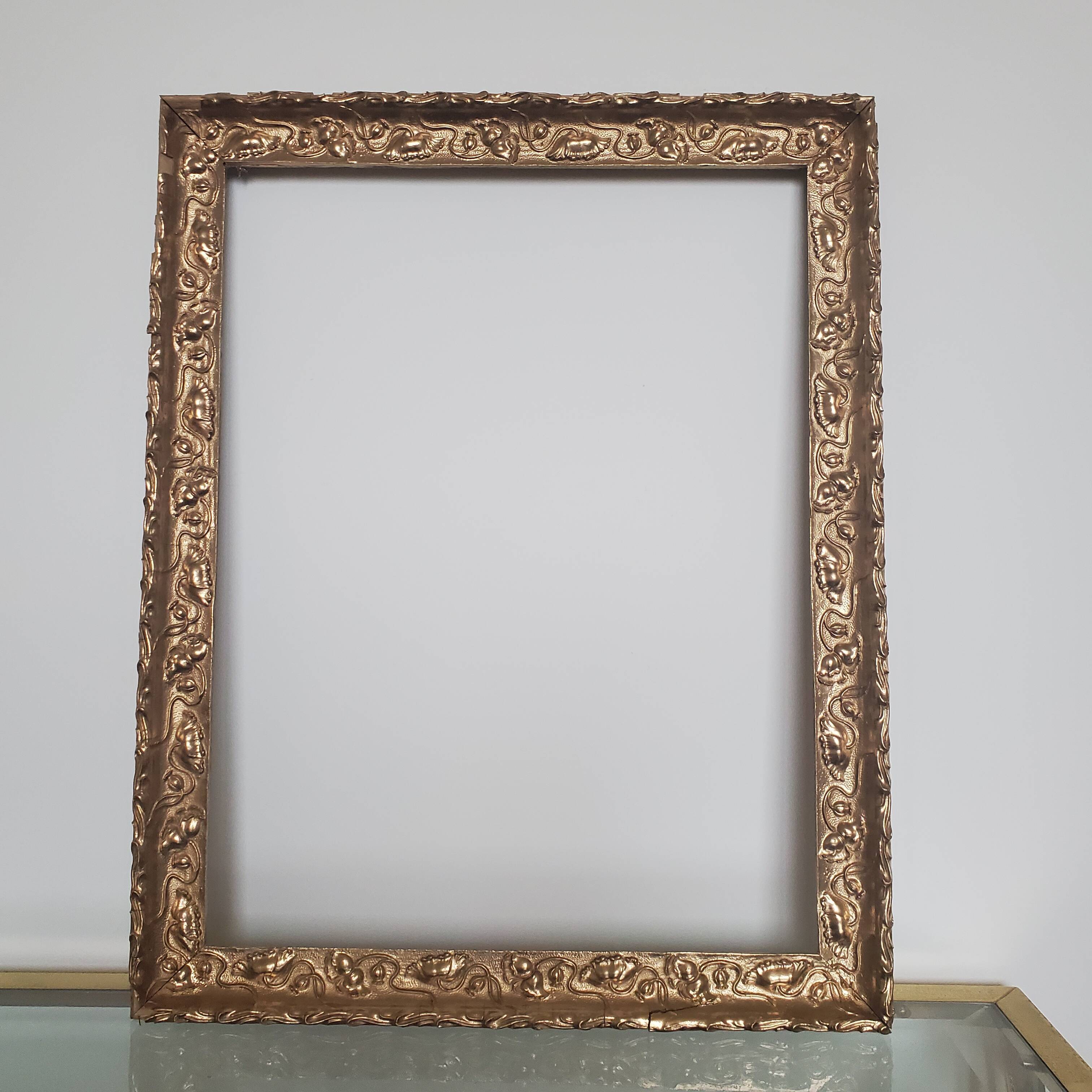 Large old gilded wooden frame
