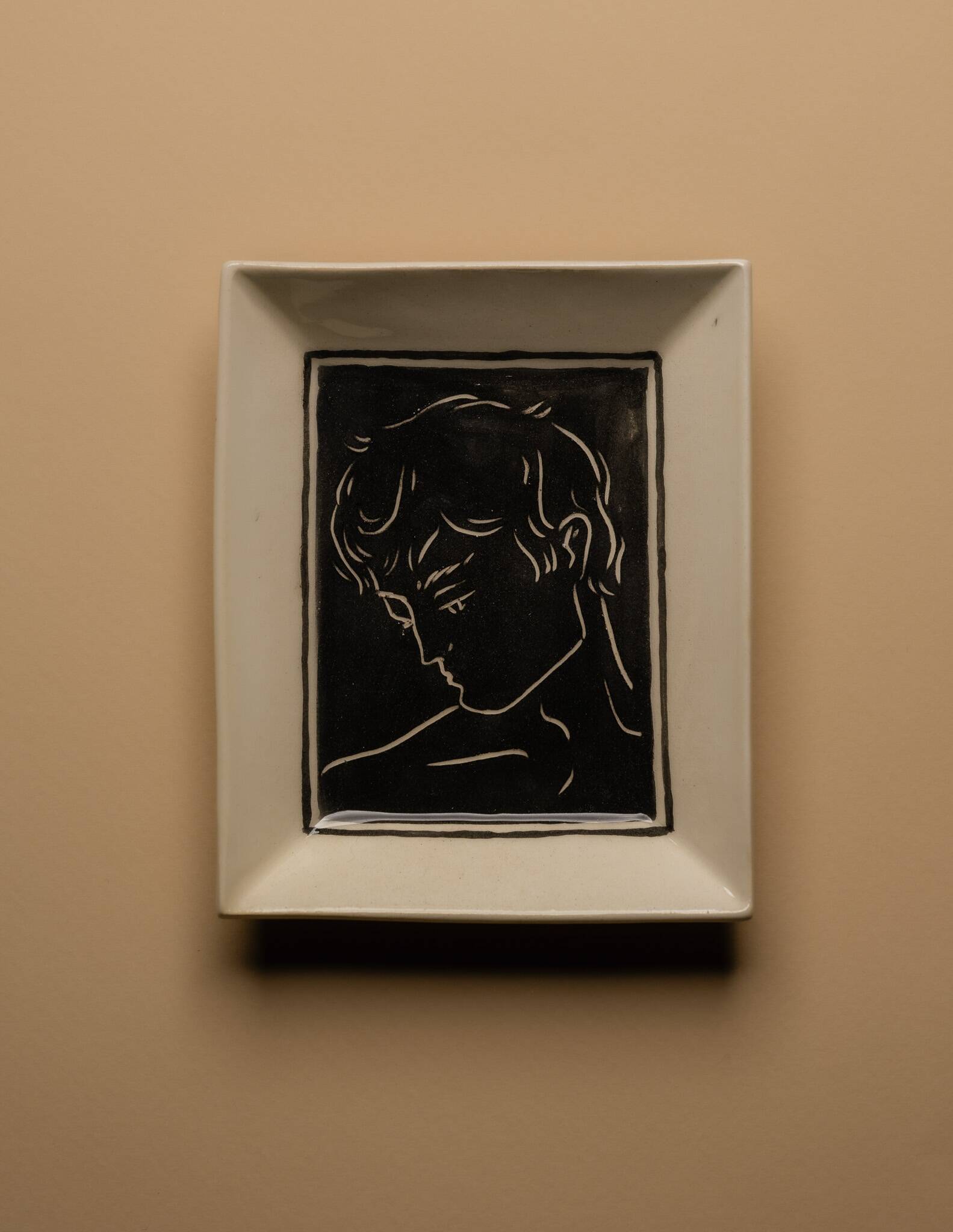 Vide-poche en céramique noire et blanche