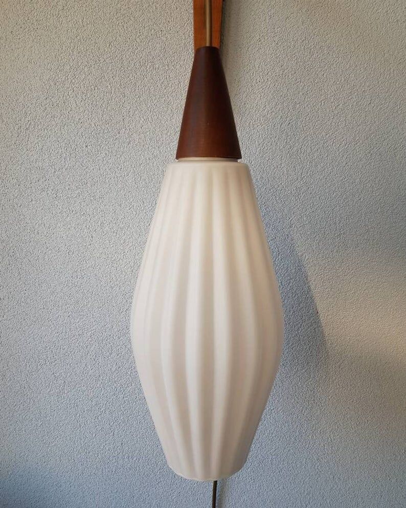Wall lamp with white glass