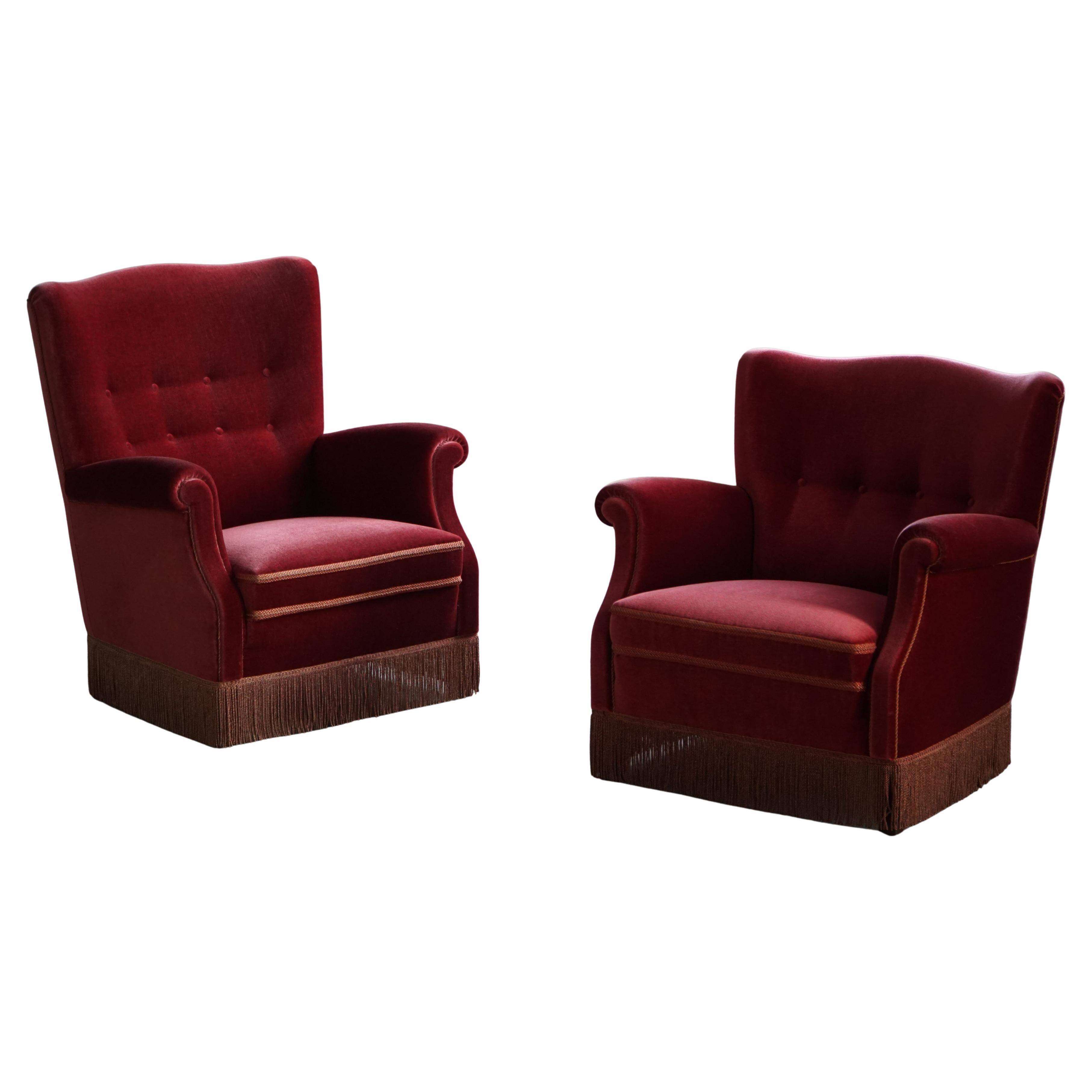 Pair of modern Danish lounge chairs, cherry red velvet, 1950s
