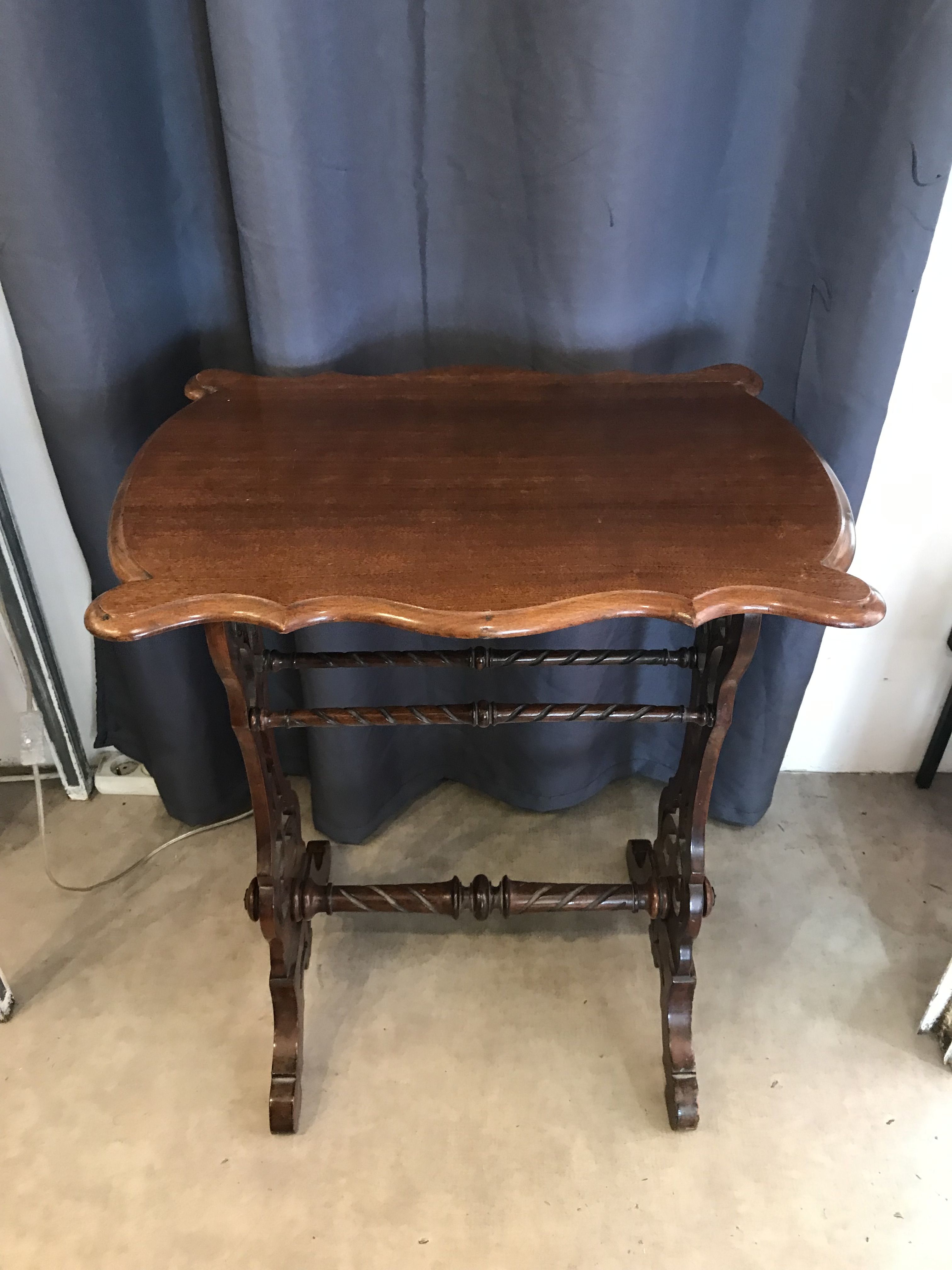 Art nouveau mahogany table with cut-out top