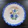 Old plate with floral decoration