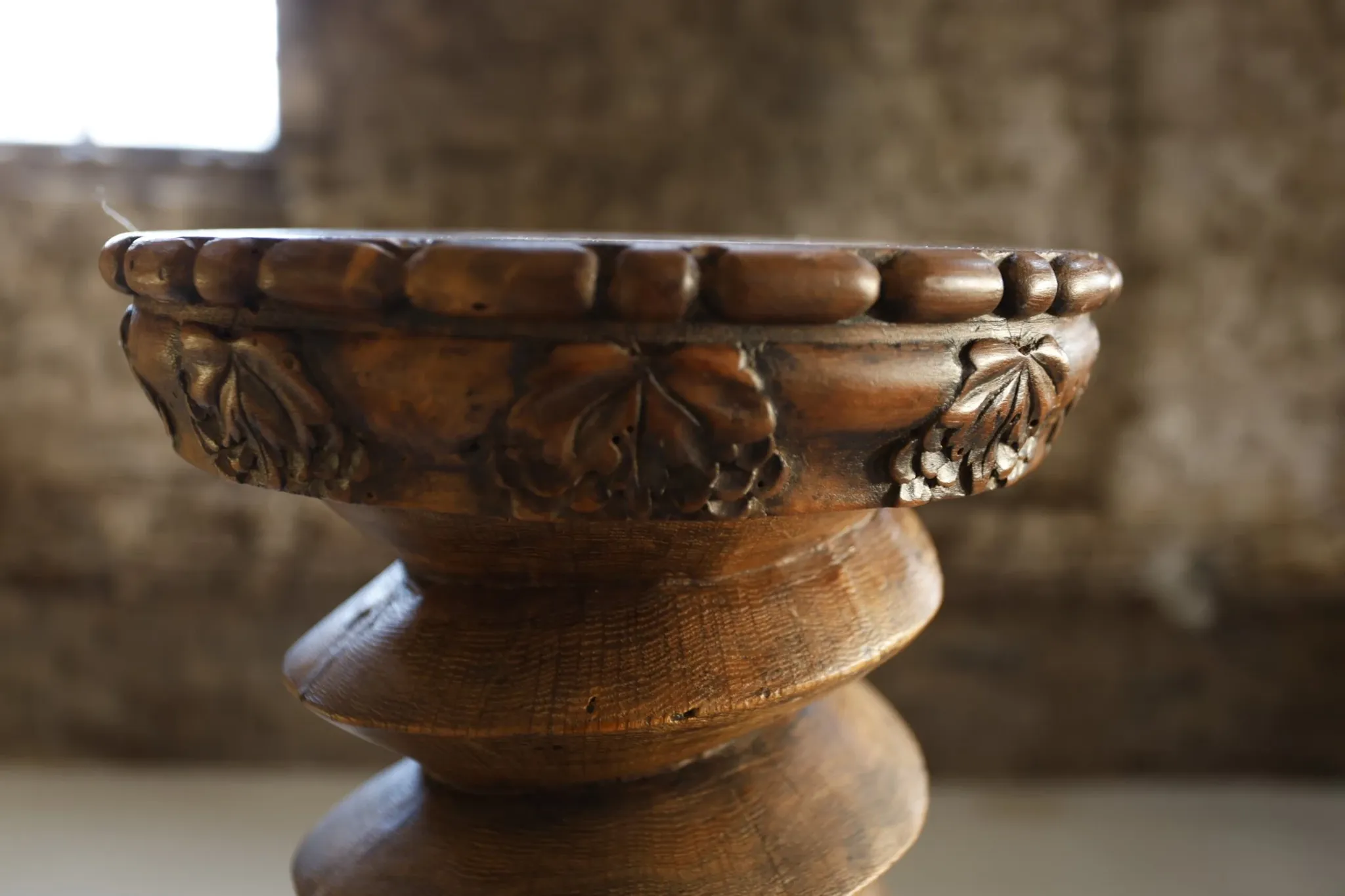 Antique French wooden plant stand with carved grape motifs