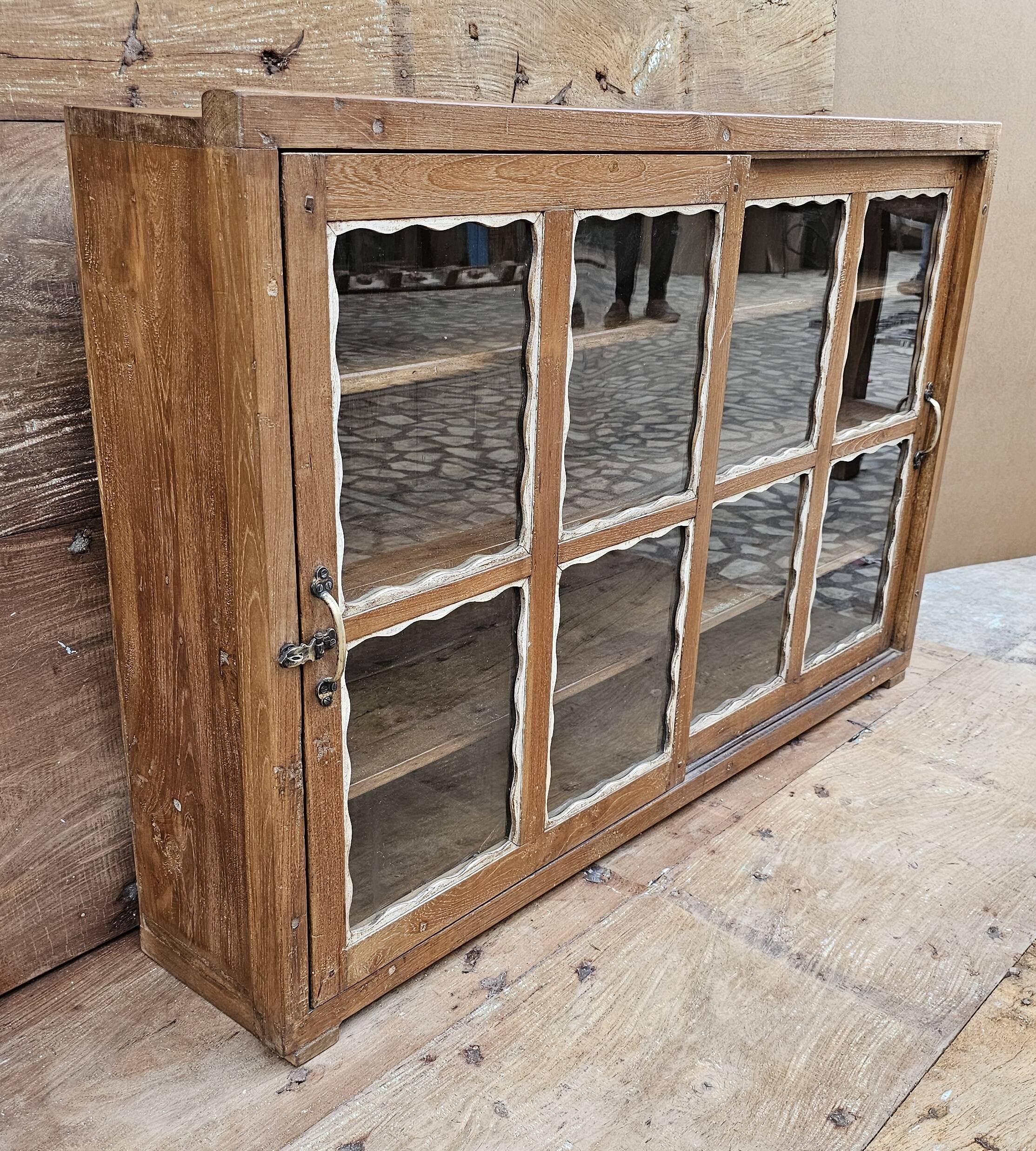 Antique Art Deco glass-fronted sideboard in Burmese teak