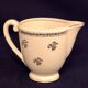 Antique milk jug in Gien earthenware, Valence model A040.