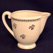Antique milk jug in Gien earthenware, Valence model A040.