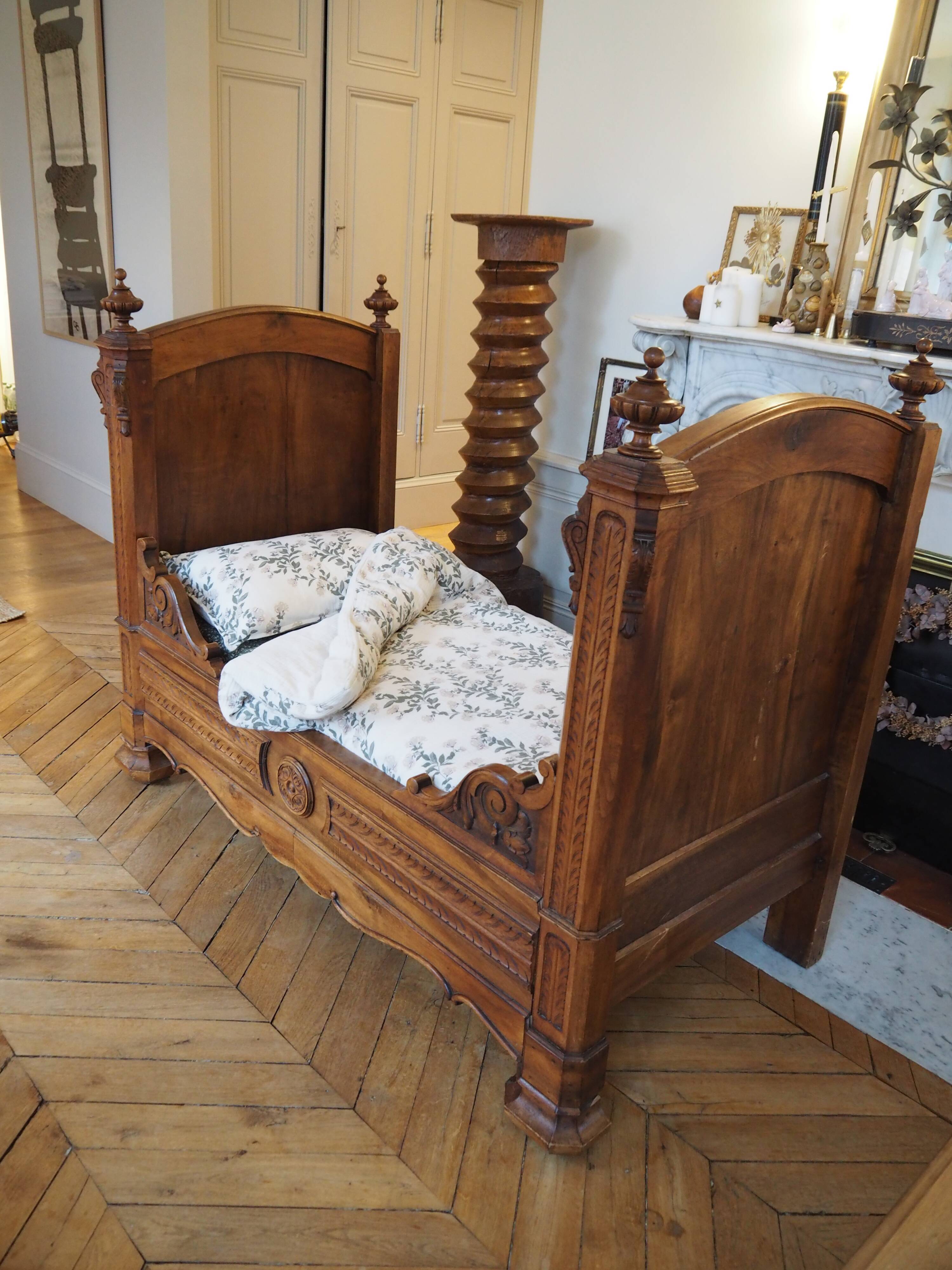 Antique carved wooden bed