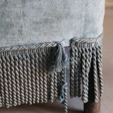 Vintage blue velvet fringed armchair.