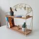 Vintage wall shelf or freestanding wicker in bohemian style.