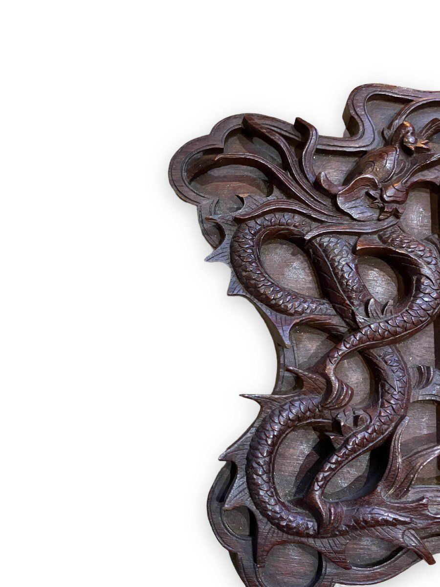 Pair of exotic wooden frames with dragons