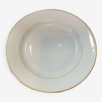 Large round white soup plate with gold outline