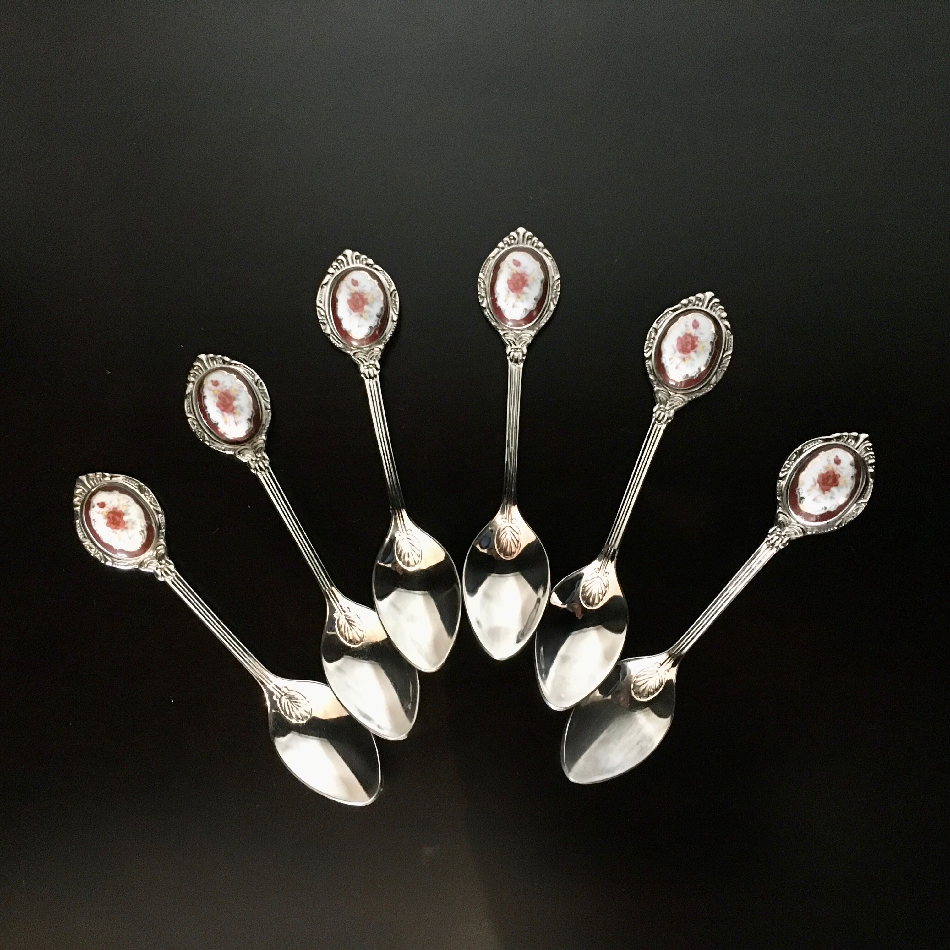 6 small spoons with porcelain medallion