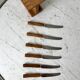 Set of 6 wooden butter knives and their support 70s