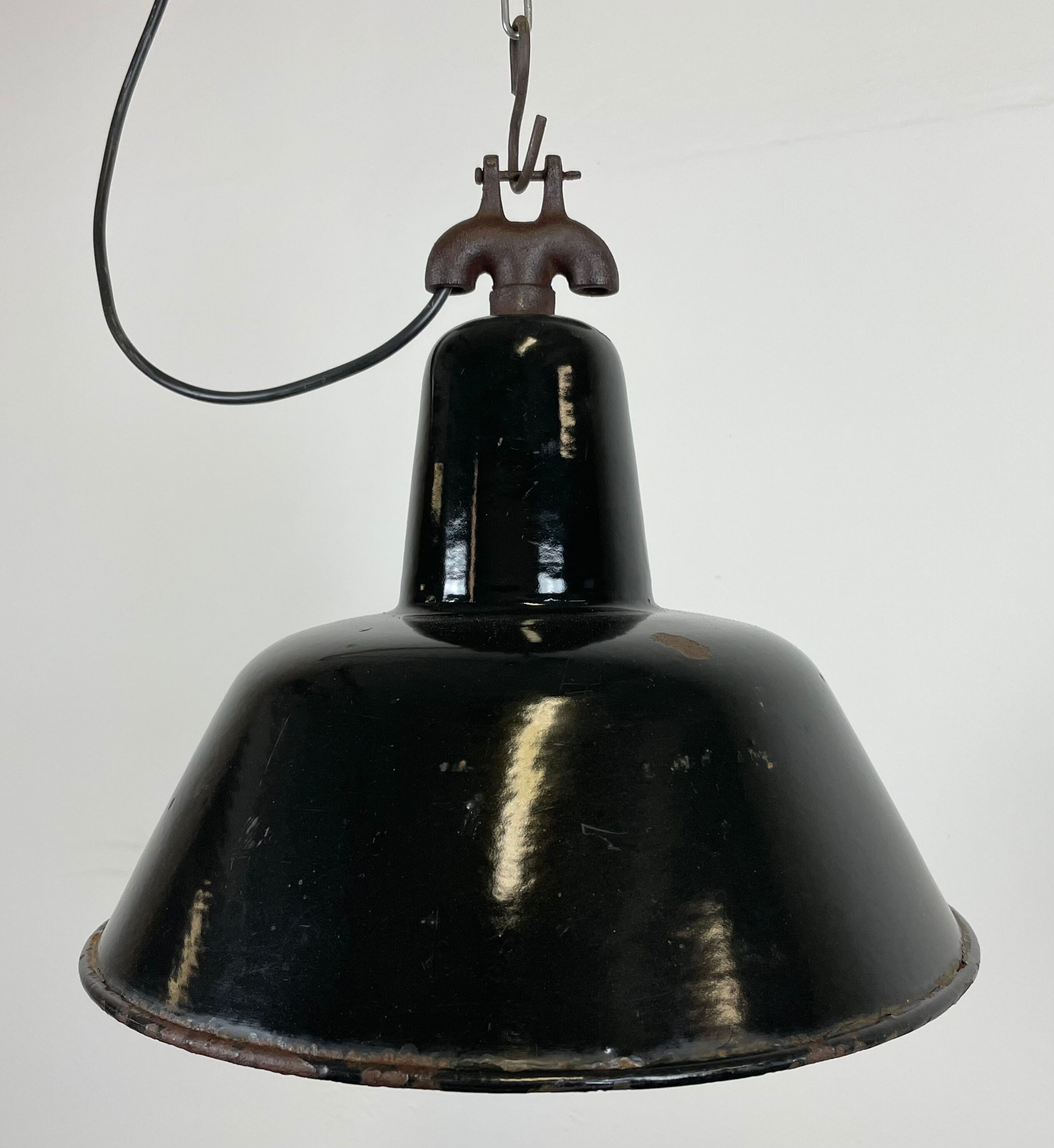 Industrial black enamel factory lamp with cast iron top, 1950s