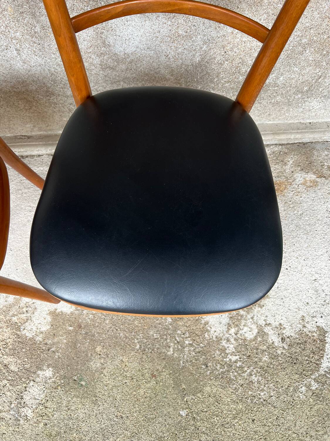 Set of 4 vintage wooden chairs with faux leather.