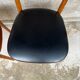 Set of 4 vintage wooden chairs with faux leather.