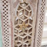 Fully hand-carved stone window with mirror
