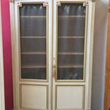 Bookcase 2 painted in ochre and cream mesh doors beginning 20 th
