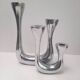 Pair of double candlesticks in aluminium cast iron