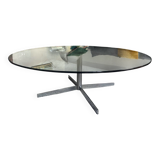 Glass coffee table with chrome base in the style of Roche Bobois