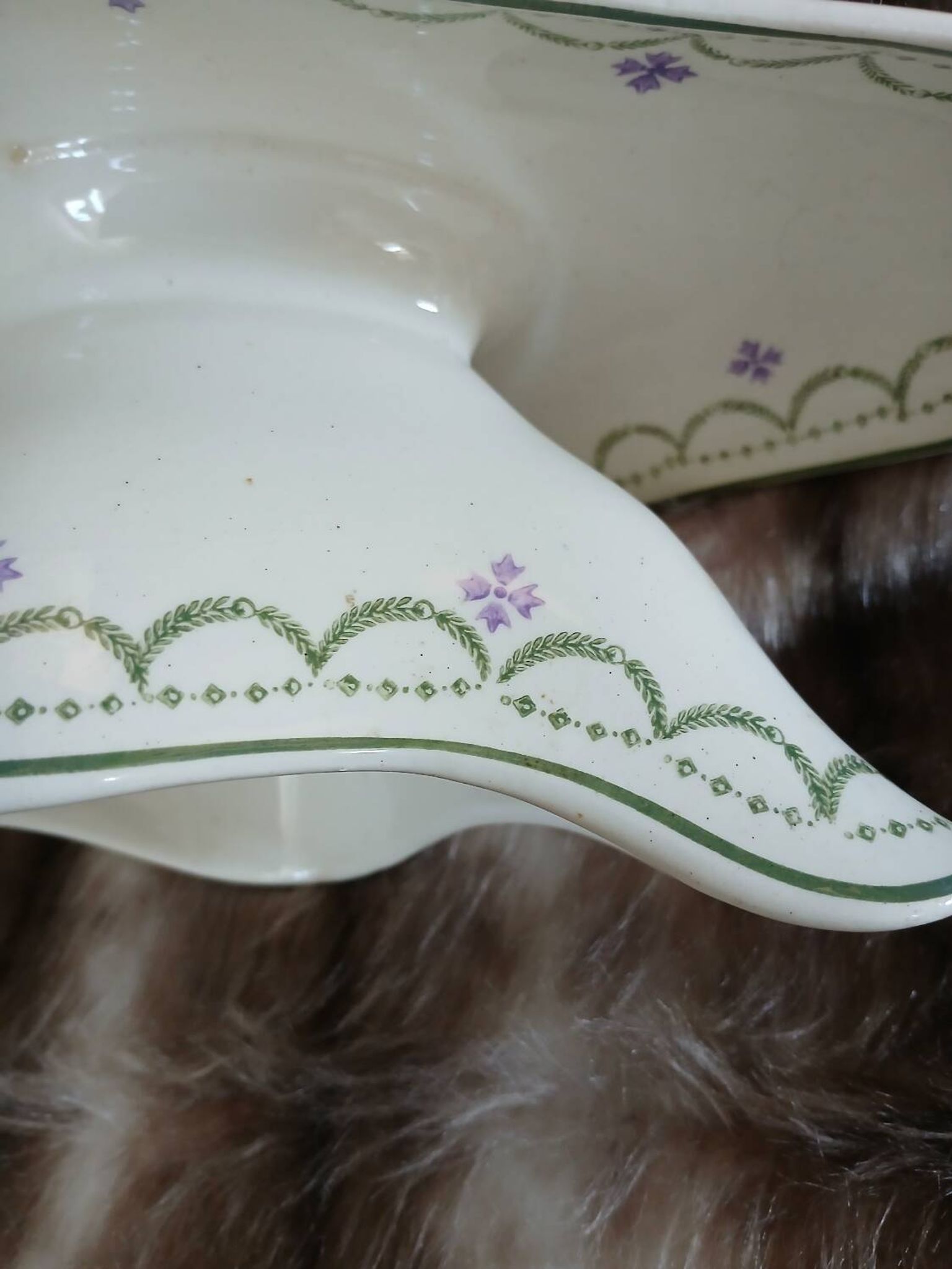 Antique sauce boat in Longwy ironstone.
