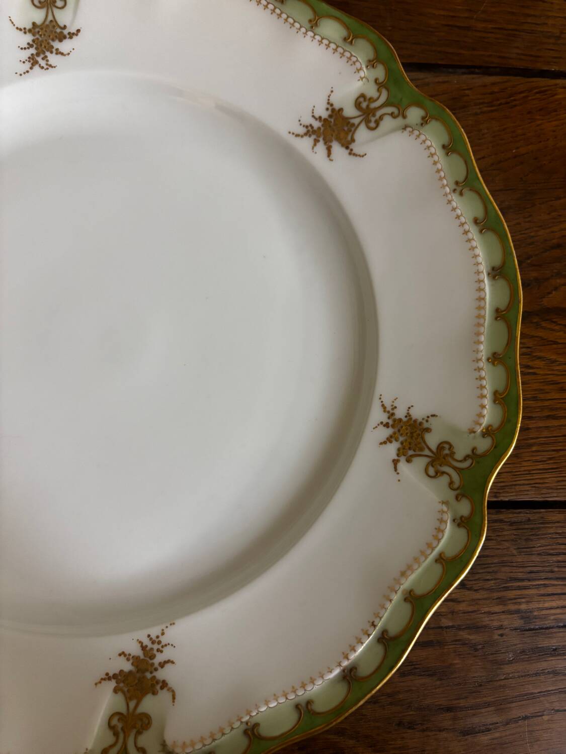 Vintage large round green porcelain serving platter with gold trim from Lim