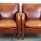 Set of 2 subtle sheepskin leather armchairs with a beautiful warm color scheme