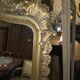 Miroir style Louis XV doré à la feuille d'or du XIXème, 181cm H