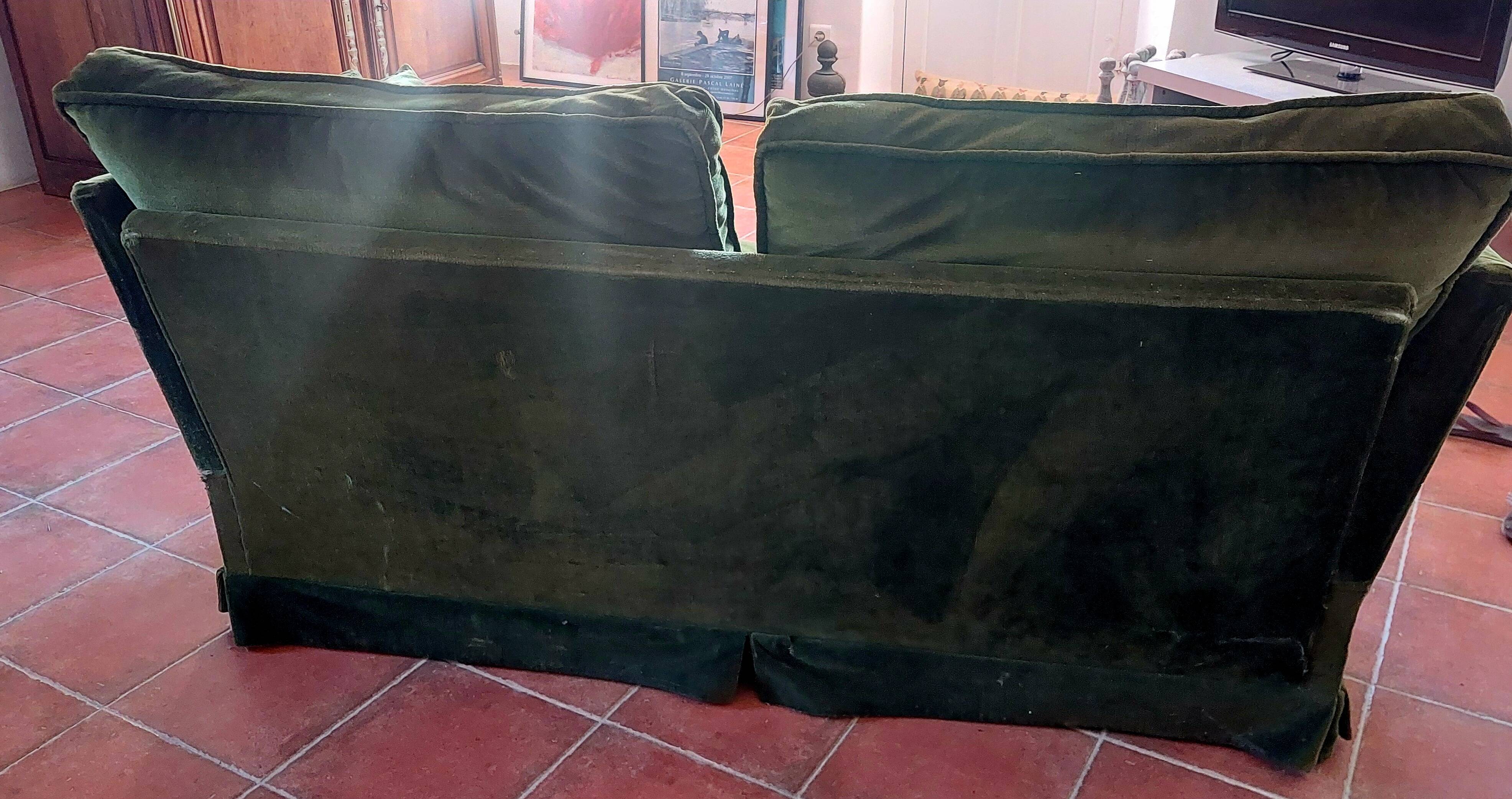 Antique green velvet sofa