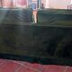 Antique green velvet sofa