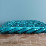 Emerald green braided slip trivet and bottle holder, knife holder