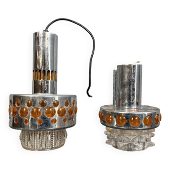 Two vintage space age pendant lamps by Raak, 1970