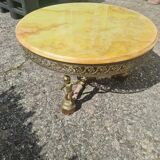 Round metal coffee table with marble top