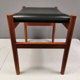 Danish designed footstool in teak wood and black skai “imitation leather”